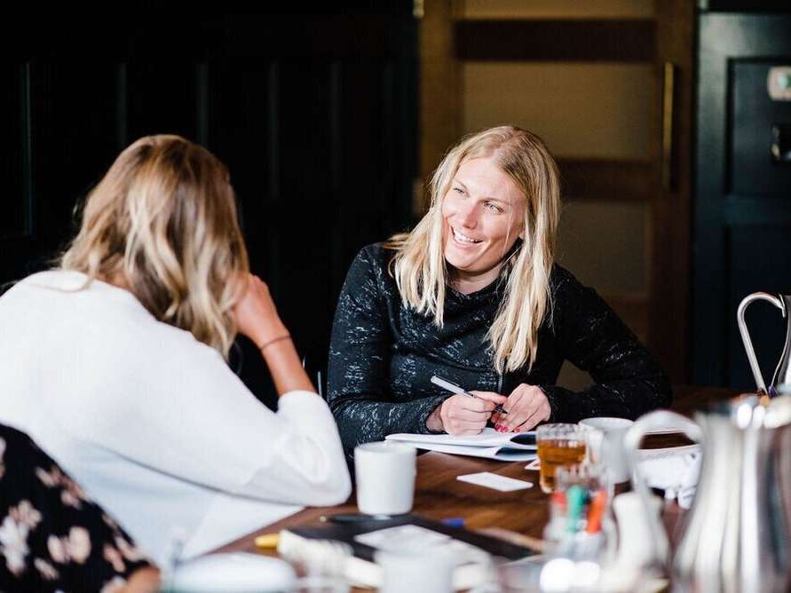 Juniper Square sales team in coaching conversation